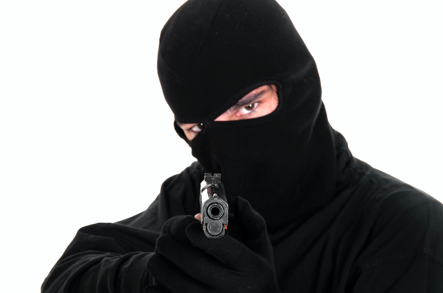 man wearing balaclava pointing a handgun otsa blog
